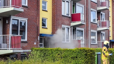 Flat in Enschede ontruimd na brand door grasmaaier