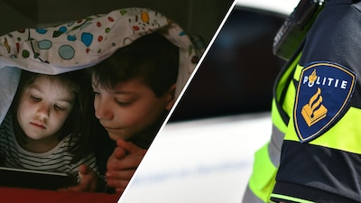 Kinderen (10 en 9) kruipen bij elkaar in bed, terwijl hun va