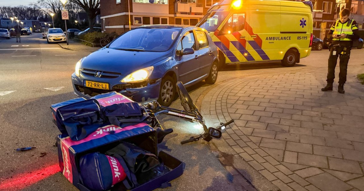 Boodschappenbezorger raakt gewond bij botsing in Enschede, automobilist aangehouden